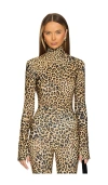 Norma Kamali Slim Fit Long Sleeve Turtleneck Top In Cheetah Patch