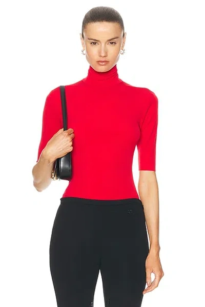 Norma Kamali Slim Fit Short Sleeve Turtleneck Top In Tiger Red