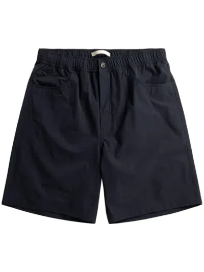 Norse Projects Minimalist Commuter Shorts With Elastic Waistband And Button Closure In Blue