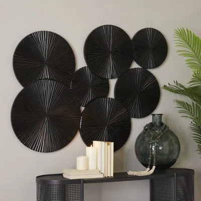 Novogratz Black Wood Plate Carved Pinwheel Home Wall Decor