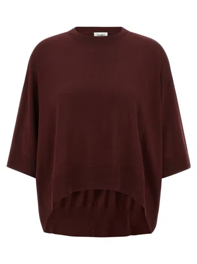 NUDE CROPPED WOOL SWEATER WITH CREW NECK AND ASYMMETRICAL HEM