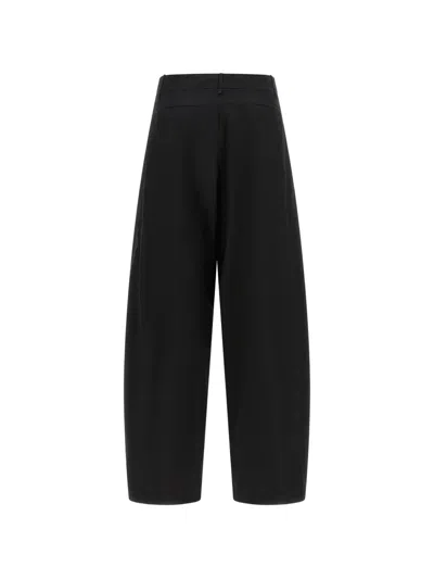 Nude Curved-leg Trousers In Black