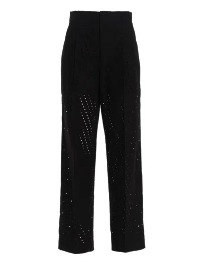NUDE PLEATED BLACK COTTON PANTS WITH INTRICATE PERFORATIONS