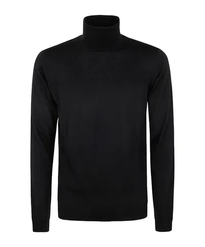Nuur Turtleneck Sweater In Black