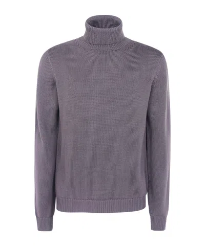Nuur Turtleneck Sweater In Blue