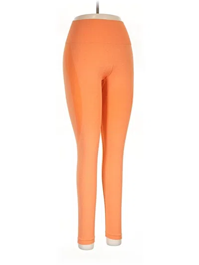 Pre-owned Nvgtn Leggings In Orange