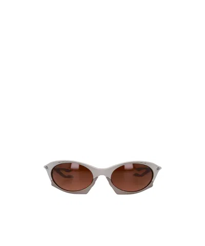 Oakley Cat's Eye Sunglasses In Brown