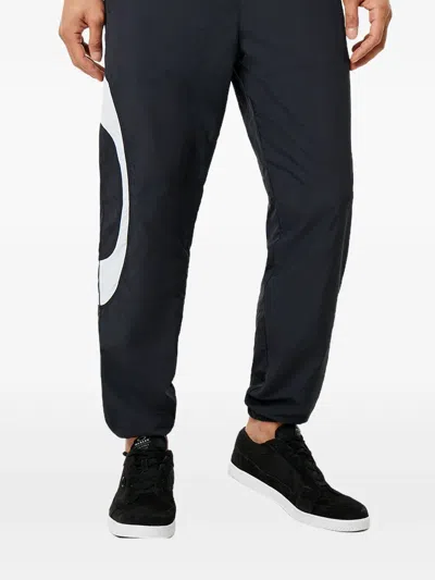 Oakley Legacy Ellipse Track Pants In Black