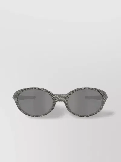 Oakley Oval Patterned Sunglasses Dark Lenses