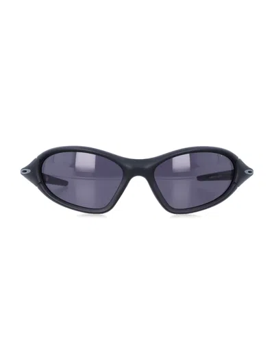Oakley Oval Sunglasses In Purple