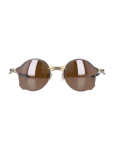 Oakley Tailend Titanium Round Rimless Sunglasses In Brown