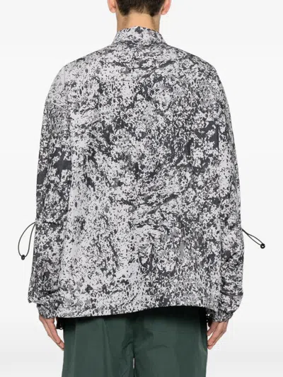 Oamc Peacemaker Tech Splatter-print Shirt Jacket In Black