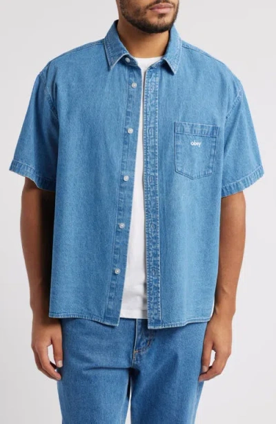 Obey Bigwig Loose Fit Short Sleeve Cotton Denim Button-up Shirt In Light Indigo