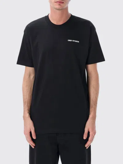 Obey T-shirt  Men Color Black