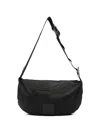 Off Grid Buckle Strap Messenger Bag In Black