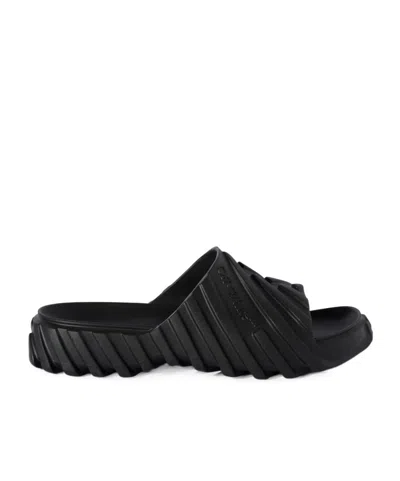 OFF-WHITE OFF-WHITE LOGO EMBOSSED SLIP-ON SLIDES