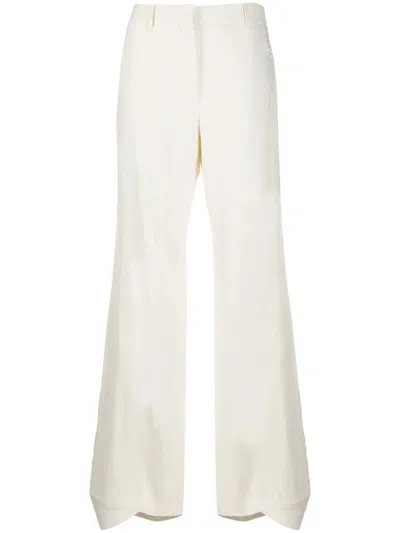OFF-WHITE OFF-WHITE FLARED CURVED CUFF TROUSERS