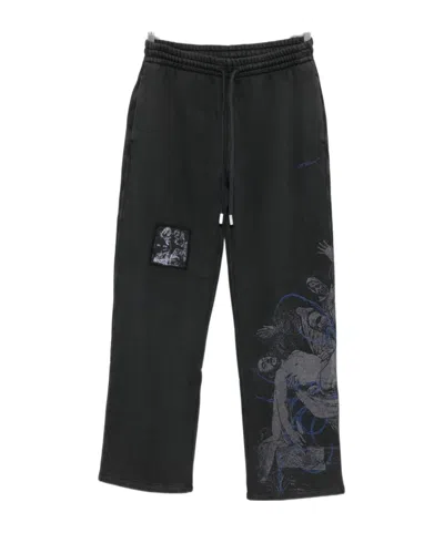 OFF-WHITE GRAPHIC-PATCH TROUSERS