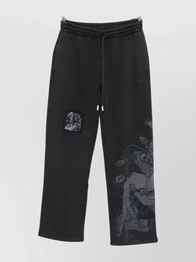 OFF-WHITE GRAPHIC PRINT SWEATPANTS SIDE POCKETS