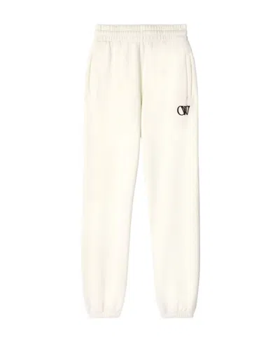 OFF-WHITE OFF-WHITE LOGO PRINTED TAPERED LEG PANTS