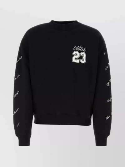 OFF-WHITE RELAXED COTTON CREWNECK WITH SIDE SLITS