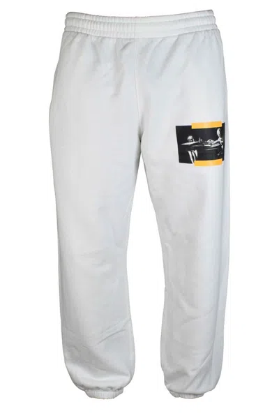 Off-white Straight-cut Jogging Pants With Diagonal Stripes And Graphic Appeal In White