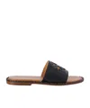 Off-white Twist Arrow Cut-out Leather Slides In Black