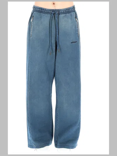 Off-white Distressed Slouch Fit Trousers In Blue