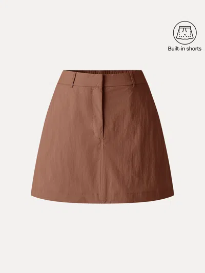 Oglmove Lightweight Water-repellent High-rise Fly-front Skort In Rust Burn Orange