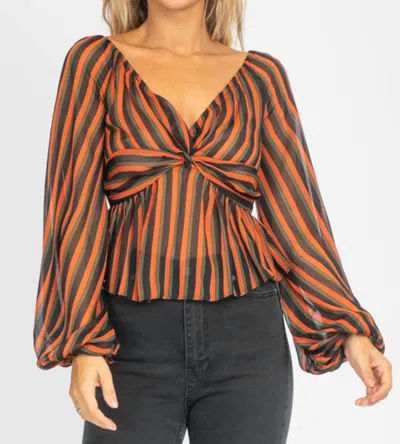OLIVACEOUS STRIPED OFF SHOULDER TOP IN RUST