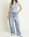 OLIVER LOGAN THOMPSON LOW SLUNG WIDE LEG DENIM TROUSERS IN LIGHT INDIGO