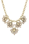 Olivia Welles Corissa Cluster Bib Necklace In Burnished Gold / Topaz