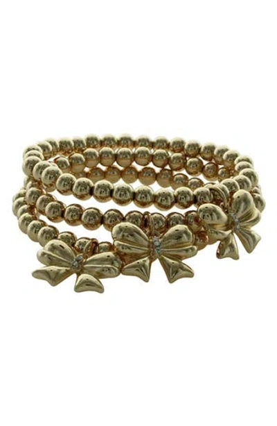 Olivia Welles Stacked Bow Bracelets In Gold
