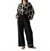 Omika Paige Pant In Solid-mussel In Black