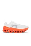 On Cloudmster Running Shoe In White & Flame