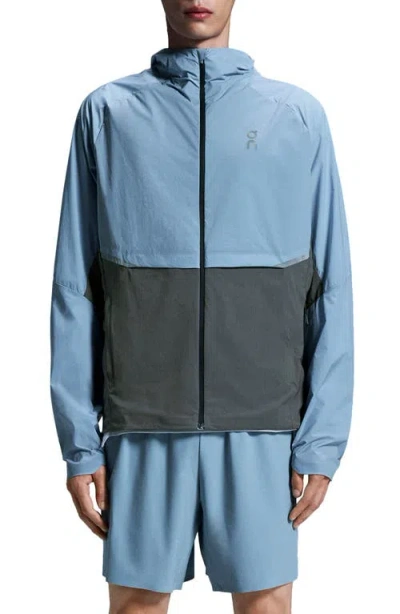 On Core Hooded Packable Running Jacket In Chambray/eclipse