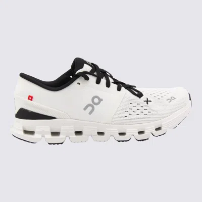 On Ivory And Black Cloud Sneakers In White