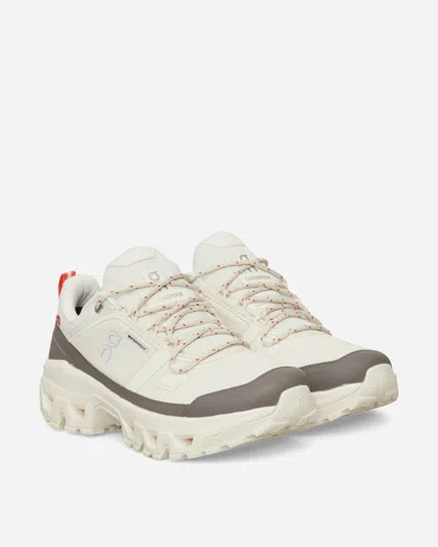 On Men S Cloudrock Low Wp Sneakers Ivory / Ivory In Sand