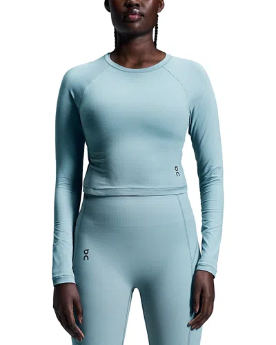 On Movement Lg Sleeve Crop Top In Coast