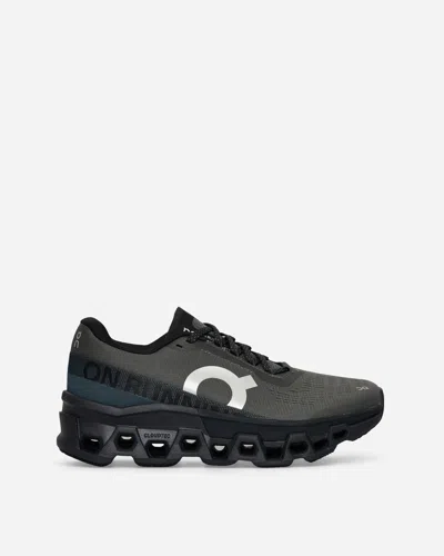 On Women S Cloudmster 2 Sneakers Asphalt / Ir In Grey