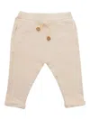 One More In The Family Cream Joggers In White