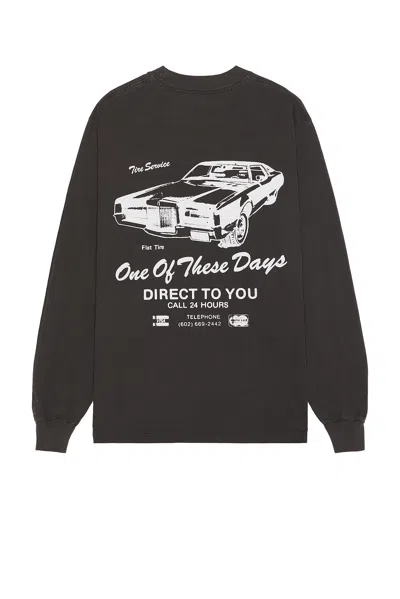 One Of These Days Tire Service Long Sleeve Tee In Washed Black