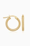 Oradina Ribbed Mini Hoops In Yellow Gold