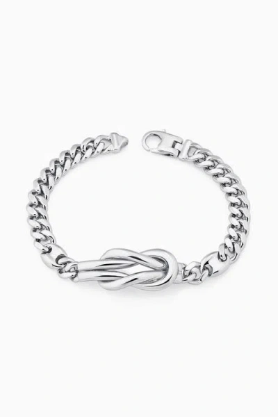 Oradina Sterling Silver Infinity Knot Curb Bracelet In Metallic
