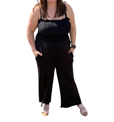 Orange Farm Clothing Smocked Jumpsuit In Black