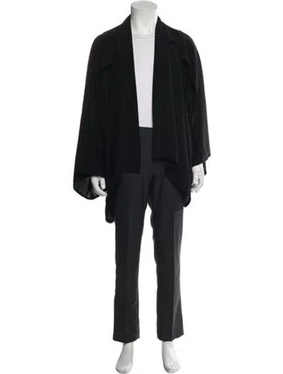 Pre-owned Orttu Poncho In Black