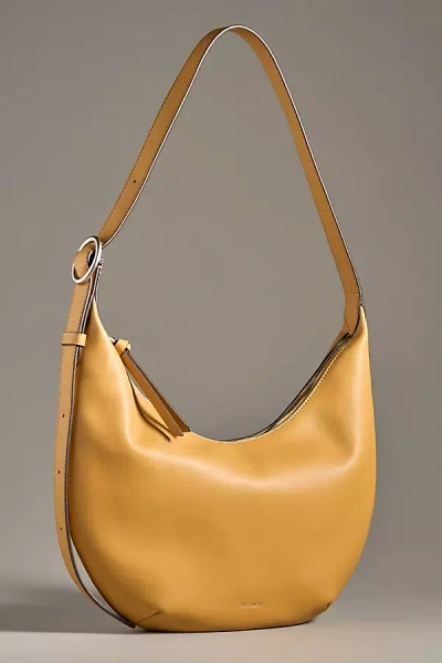 Oryany Crescent Shoulder Bag In Yellow