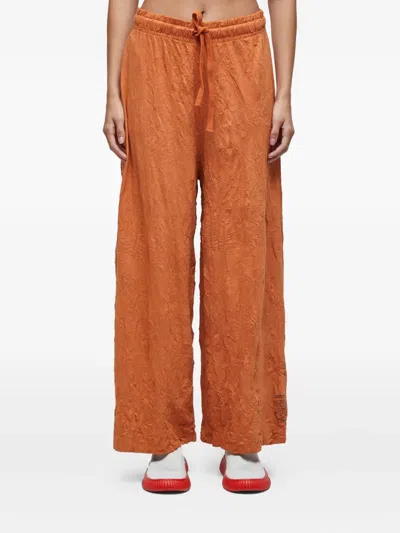 Osklen Wrinkle-effect Trousers In Orange