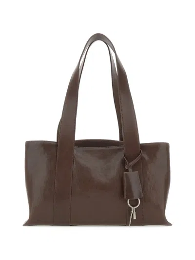 Osoi Shell Duffel Leather Shoulder Bag In Brown