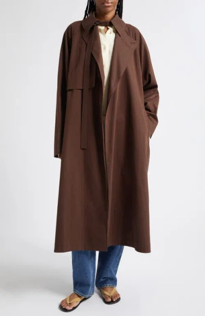 Ossou Delta Trench Coat In Brown